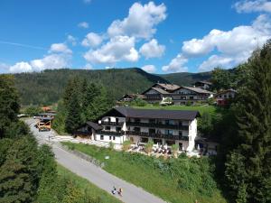 a large building on the side of a road at Montara Suites Bodenmais I aktivCARD Bayerischer Wald inklusive in Bodenmais