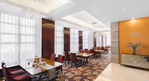 Posezení v ubytování New Century Pujiang Hotel