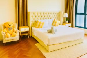 Ένα ή περισσότερα κρεβάτια σε δωμάτιο στο The Mews KLCC Stay Happy +51 φωτογραφίες