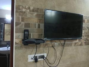 TV a/nebo společenská místnost v ubytování Sammruddhi Groups Budget