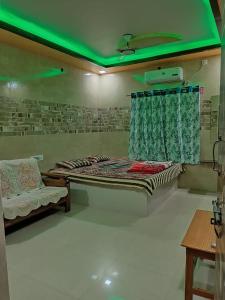 Posezení v ubytování Sammruddhi Groups Budget