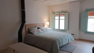 Postel nebo postele na pokoji v ubytování Casa Albacora 1892