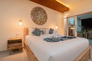 Ένα ή περισσότερα κρεβάτια σε δωμάτιο στο Inda Villa Ubud by Bali Cabin +22 φωτογραφίες