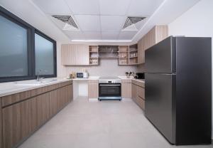 Gallery image of Luxury Villa in Ajmal Makan with private pool in Al Ḩamrīyah