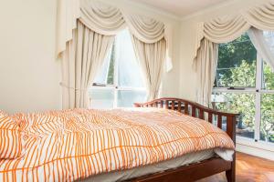 Postel nebo postele na pokoji v ubytování Abbotsford Private Rooms & Pods - 15 Charles Homestay