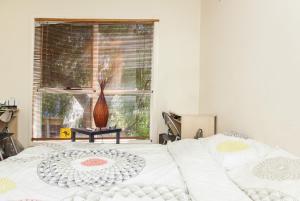 Postel nebo postele na pokoji v ubytování Abbotsford Private Rooms & Pods - 15 Charles Homestay