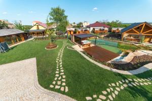 an aerial view of a yard with a swimming pool at Wellnes Hříbek in Dyjákovice