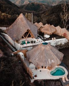 an aerial view of a resort with a swimming pool at Nanti Villas Lombok in Kuta Lombok