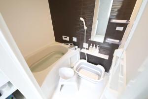 Koupelna v ubytování インテグラル大手町 203