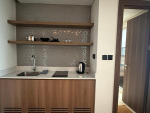 Η κουζίνα ή μικρή κουζίνα στο Tes Haus Phu Yen