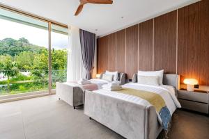 Ένα ή περισσότερα κρεβάτια σε δωμάτιο στο Grand View Lagoon - private paradise in Phuket +72 φωτογραφίες