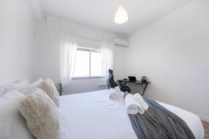 Ένα ή περισσότερα κρεβάτια σε δωμάτιο στο Nordic Breeze