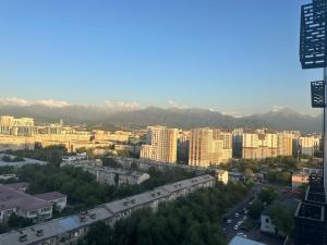 an aerial view of a city with buildings and cars at ЖК Кристалл 160К7 15 этаж 846 in Almaty