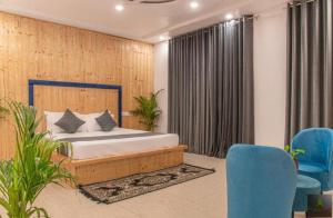 Postel nebo postele na pokoji v ubytování 4 Bhk Serviced Villa I Open Air Terrace