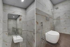 un bagno con wc, doccia e lavandino di Super Hotel O Rudrapur Railway Junction Formerly Krish a Rudrapur