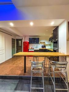 Kuchyň nebo kuchyňský kout v ubytování L'échappée