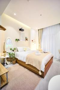 Ένα ή περισσότερα κρεβάτια σε δωμάτιο στο take me 3seasons