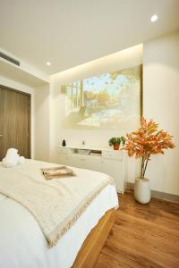 Ένα ή περισσότερα κρεβάτια σε δωμάτιο στο take me 3seasons +45 φωτογραφίες