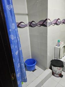 Ένα μπάνιο στο Appartement proche de la mer