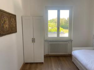 Postel nebo postele na pokoji v ubytování Ranch B Home & Suite