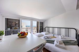 Postel nebo postele na pokoji v ubytování Estúdio Praia da Luz