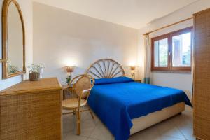 Una cama o camas en una habitación de Residence della torre