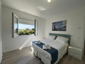 Postel nebo postele na pokoji v ubytování Campodarsego Central Apartment