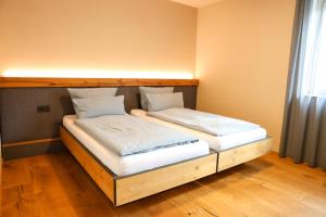 Ένα ή περισσότερα κρεβάτια σε δωμάτιο στο Landjuwel