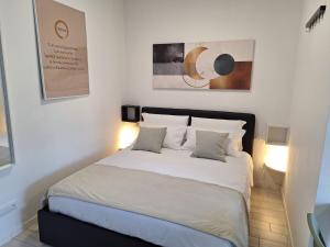 Ένα ή περισσότερα κρεβάτια σε δωμάτιο στο Kibou Apartment by Quokka 360 - Half an hour from the centre of Milan