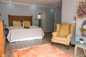 Postel nebo postele na pokoji v ubytování Le Opstal, a Scenic Farm Stay near Rustenburg + 38 fotografií