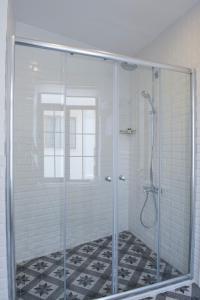 a shower with a glass door in a bathroom at Rodosto Hotel in Tekirdağ +42 photos