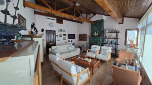a living room with couches and a table at Dardanelles1915 in Canakkale