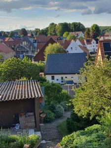 a view of a village with houses and trees at Nolte-Luxus Wohnung in Warburg