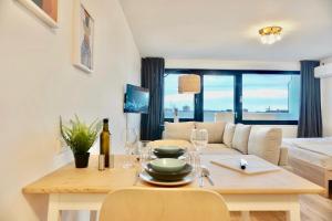 Posezení v ubytování 2 separate Apartments direkt in der City mit privaten Stellplätzen max 1,65m Höhe und 1,8m Breite für bis zu 8 Personen