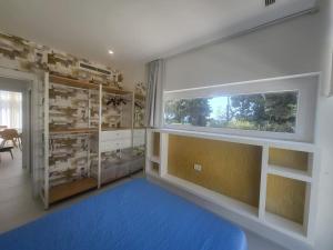 Postel nebo postele na pokoji v ubytování Villa Pizzolungo by PosarelliVillas