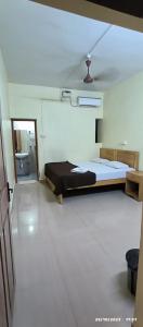 カナコナにあるThyme Guests Houseの部屋にベッドがある寝室