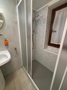 a bathroom with a shower and a sink at Maen apartment, Valtournenche in Valtournenche +7 photos