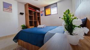 Ένα ή περισσότερα κρεβάτια σε δωμάτιο στο Sunset Surf Cozy Stay in Imsouane