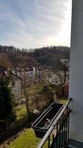 a boat sitting on top of a balcony at Charmante, ruhige Erdgeschosswohnung mit Balkon in Lüdenscheid
