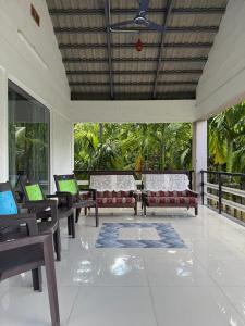 Posezení v ubytování Murthi's Farm House