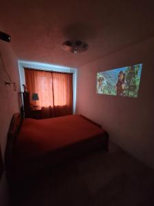 Giường trong phòng chung tại Квартира з балконом 2 кімнати вул 23 серпня 13А