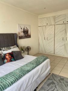 Postel nebo postele na pokoji v ubytování Coastal Harmony