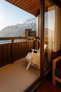 a balcony with a view of a snowy mountain at Résidence La Daille - Val-d'Isère in Val dʼIsère