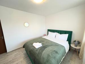 Ένα ή περισσότερα κρεβάτια σε δωμάτιο στο Central Palace Suite with Self Checkin