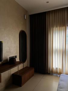 Μια τηλεόραση ή/και κέντρο ψυχαγωγίας στο Townsquare Residency