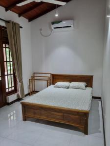 Postel nebo postele na pokoji v ubytování Cinnamon Vibe Family Resort