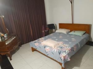 Postel nebo postele na pokoji v ubytování Cinnamon Vibe Family Resort + 6 fotografií