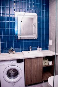 Ένα μπάνιο στο Дизайнерські апартаменти в ЖК DreamTown 10А