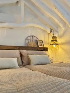 a bedroom with two beds in a tent at La Luz in Zuheros