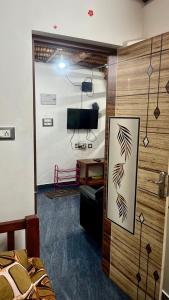 Μια τηλεόραση ή/και κέντρο ψυχαγωγίας στο The SERENITY BAY HOME Stay